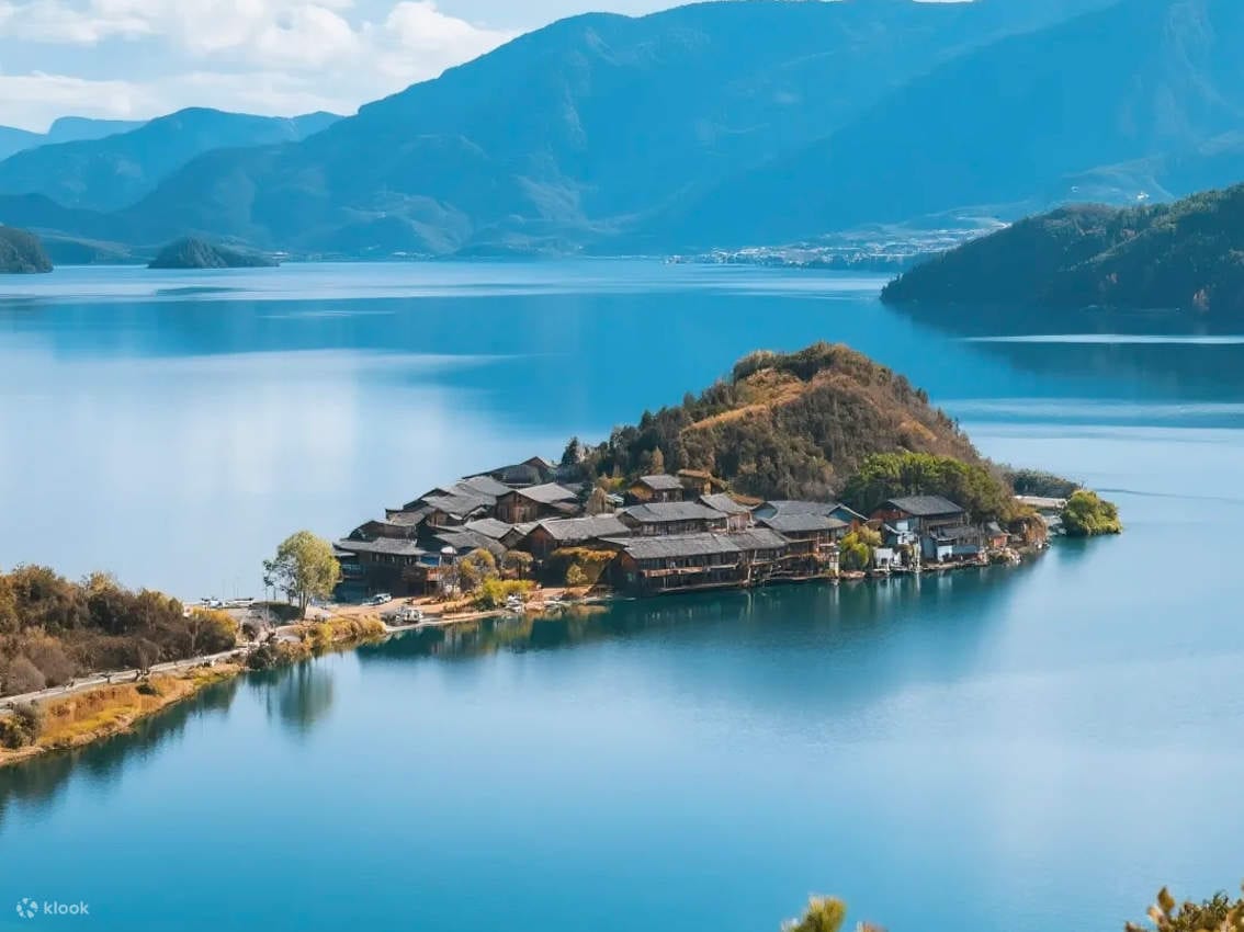 Lugu Lake's mystical realm: the sacred lake embraced by mountains, a daughterland.